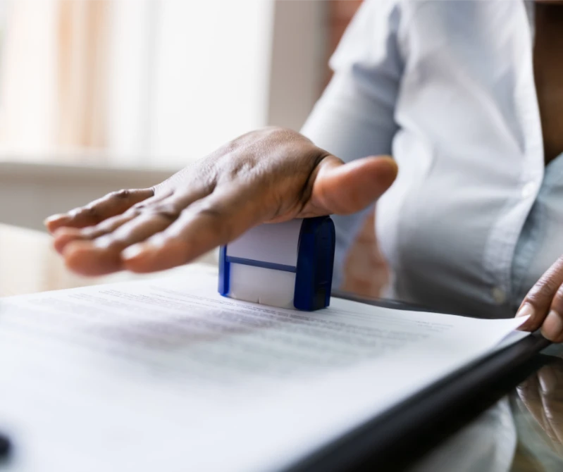 notary stamping a document
