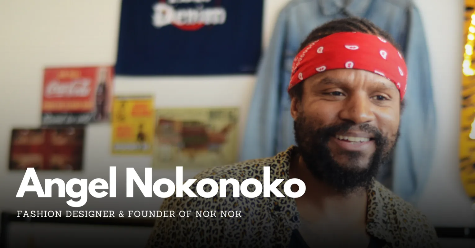 Angel Nokonoko with red bandana smiling