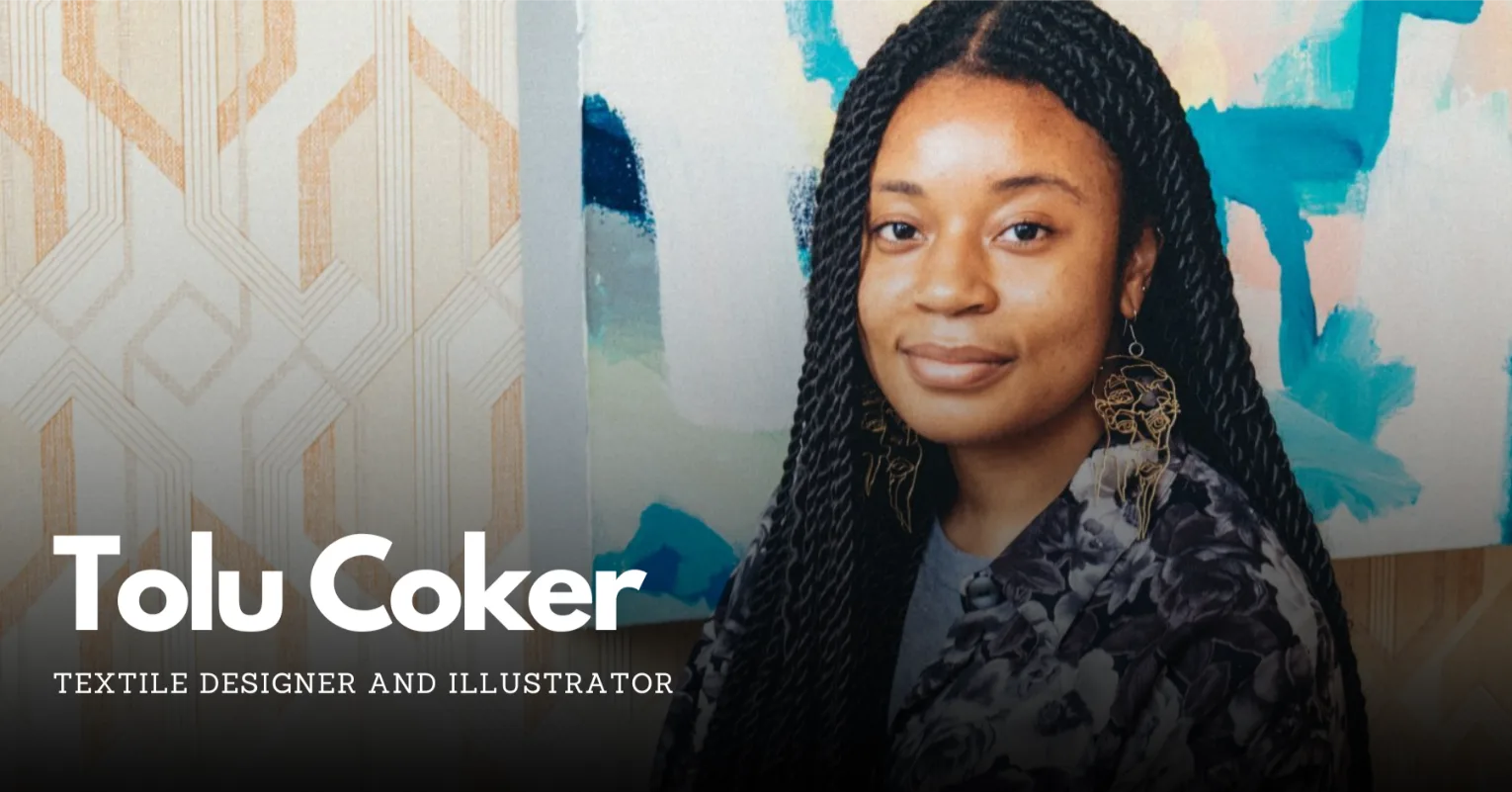 Tolu Coker poses for picture in front of artwork