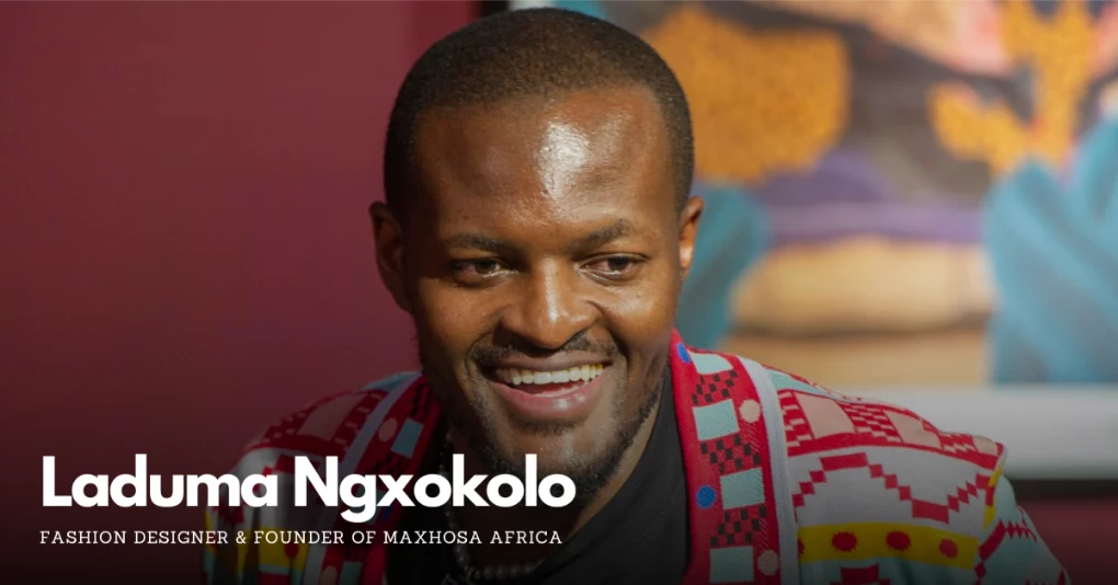 head shot of Laduma Ngxokolo smiling