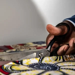 scissor cutting fabric