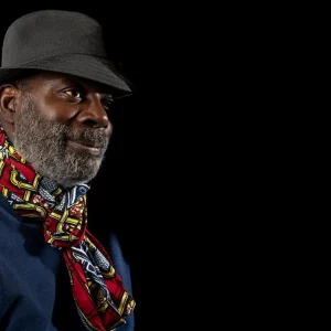 Roberto Rashid with a scarf and hat on